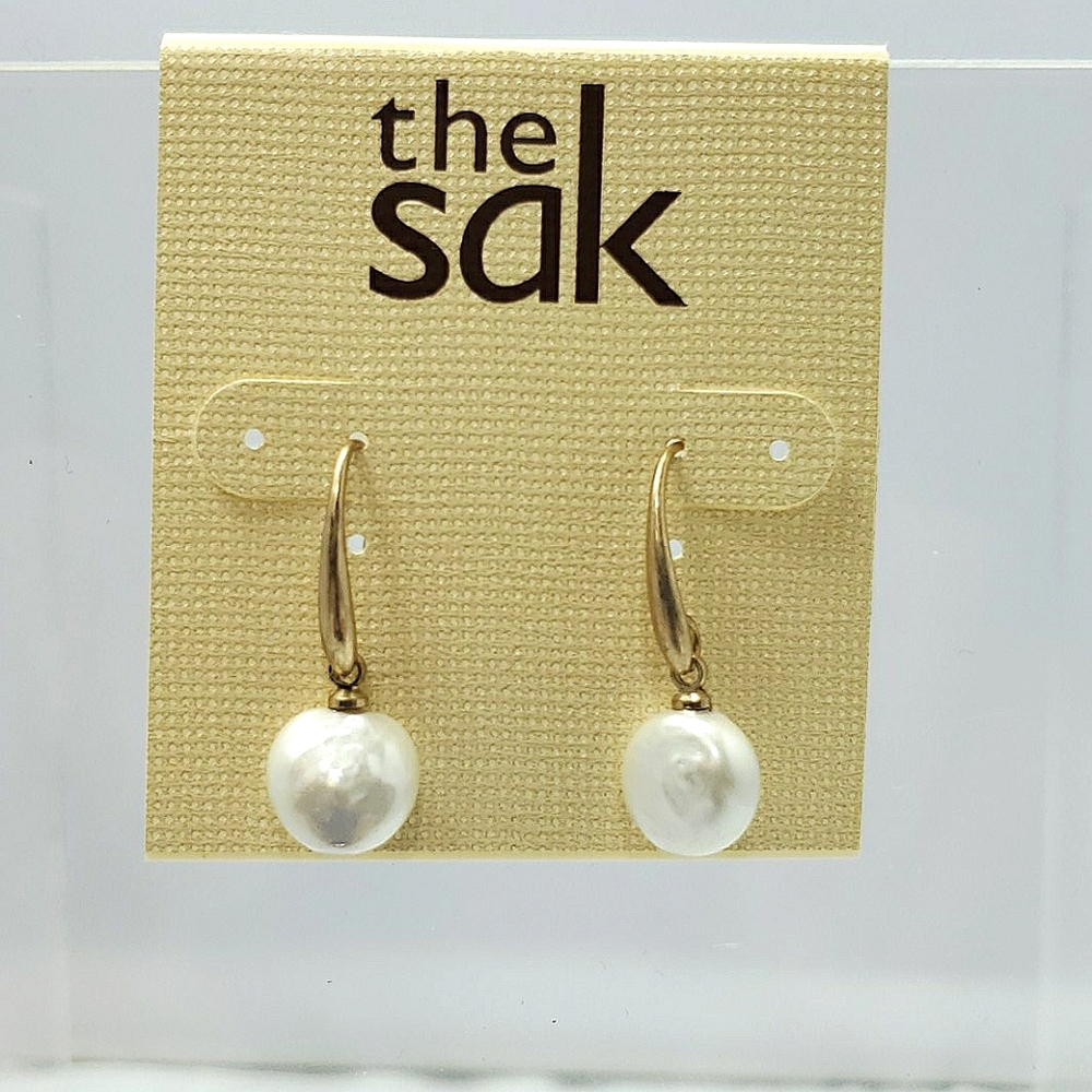 The Sak gold pearl dangle fish hook earrings